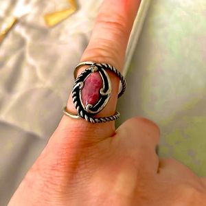 Silver double strand ring with rope detailing and mauve pink stone.